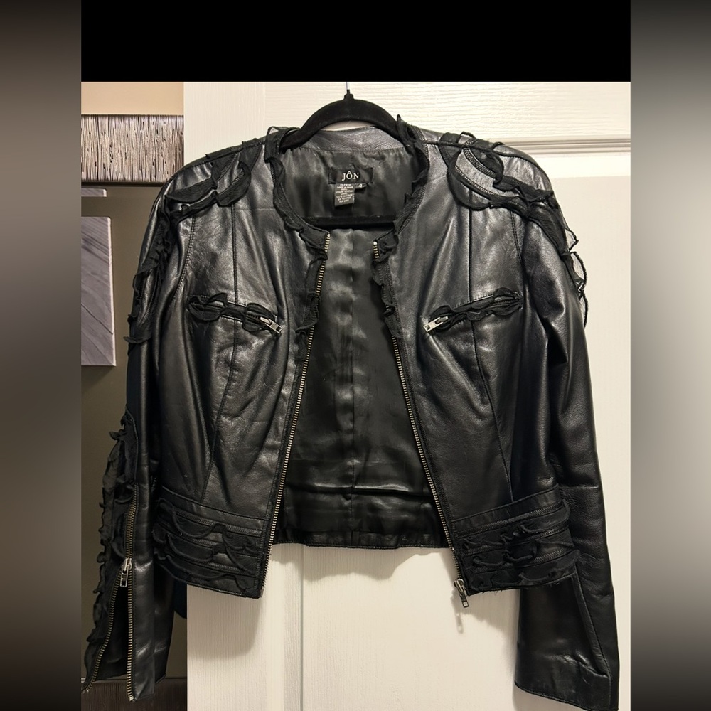 Unique and chic Women's Black Leather Jacket with Lace Details